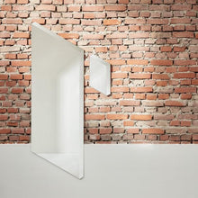 Load image into Gallery viewer, The Facett Mirror by Puik in small and medium against a brick wall.